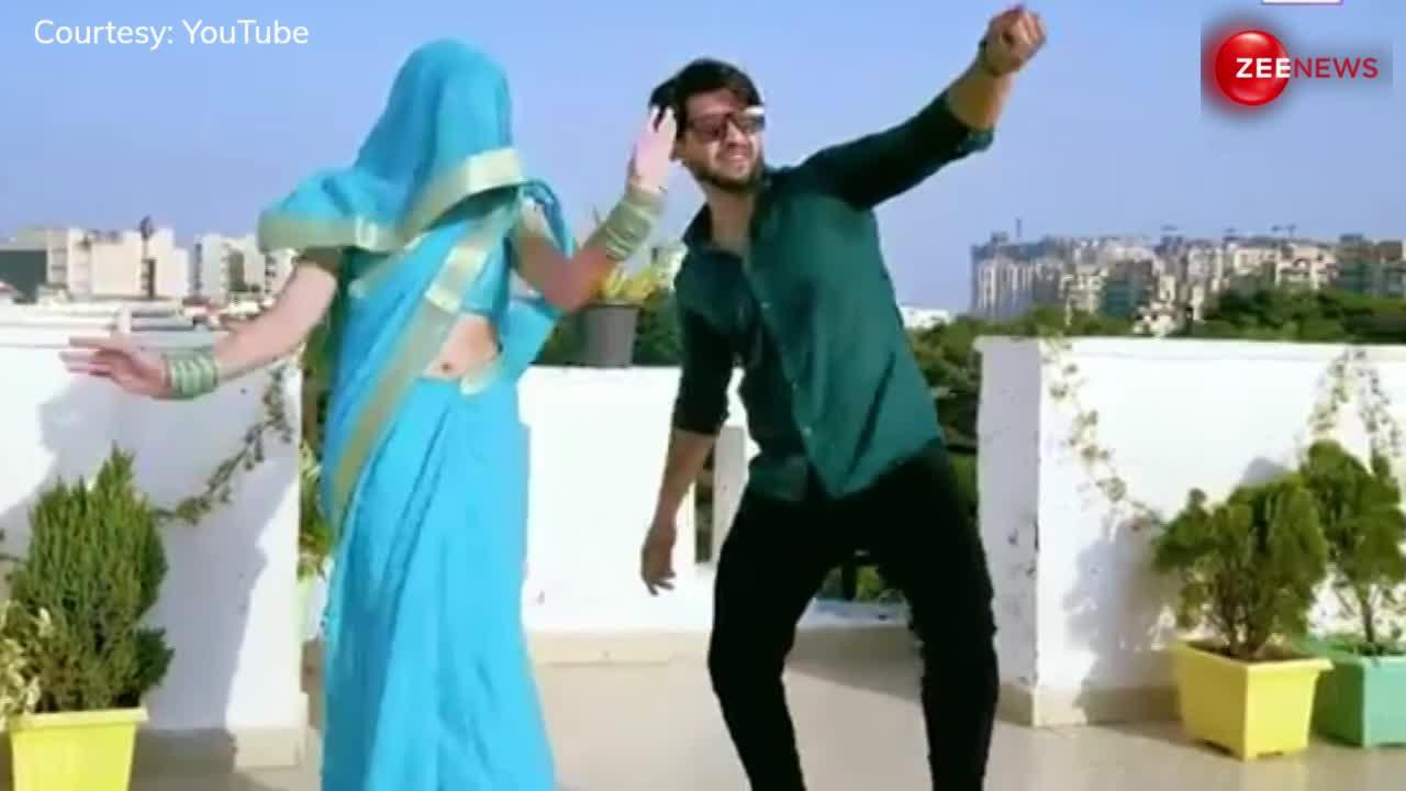 Couple Dance: नीली साड़ी पहन पत्नी ने लचकाई कमर तो चश्मा लगा पति ने दिखाया धांसू डांस, हरियाणवी गाने पर कपल ने किया बोल्ड डांस