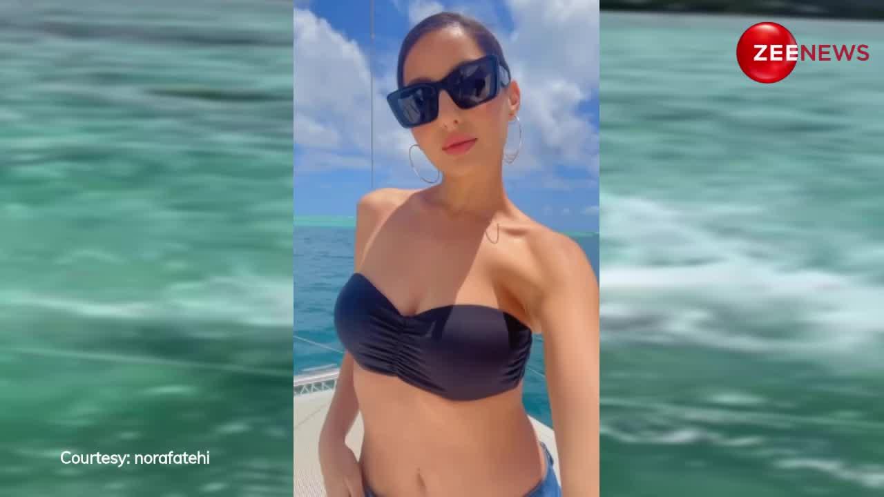 Nora Fatehi ने हद से ज्यादा छोटे कपड़े पहन समुद्र के बीच की मस्ती, दिखाया अपनी कमसिन कमरिया का जादू, देखें Video