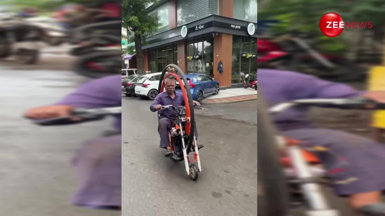 सूरत की सड़कों पर चलती दिखी अकल्पनीय Electric Ring Bike, 65 साल के बुजुर्ग अंकल का करिश्मा रातों-रात इंटरनेट पर वायरल