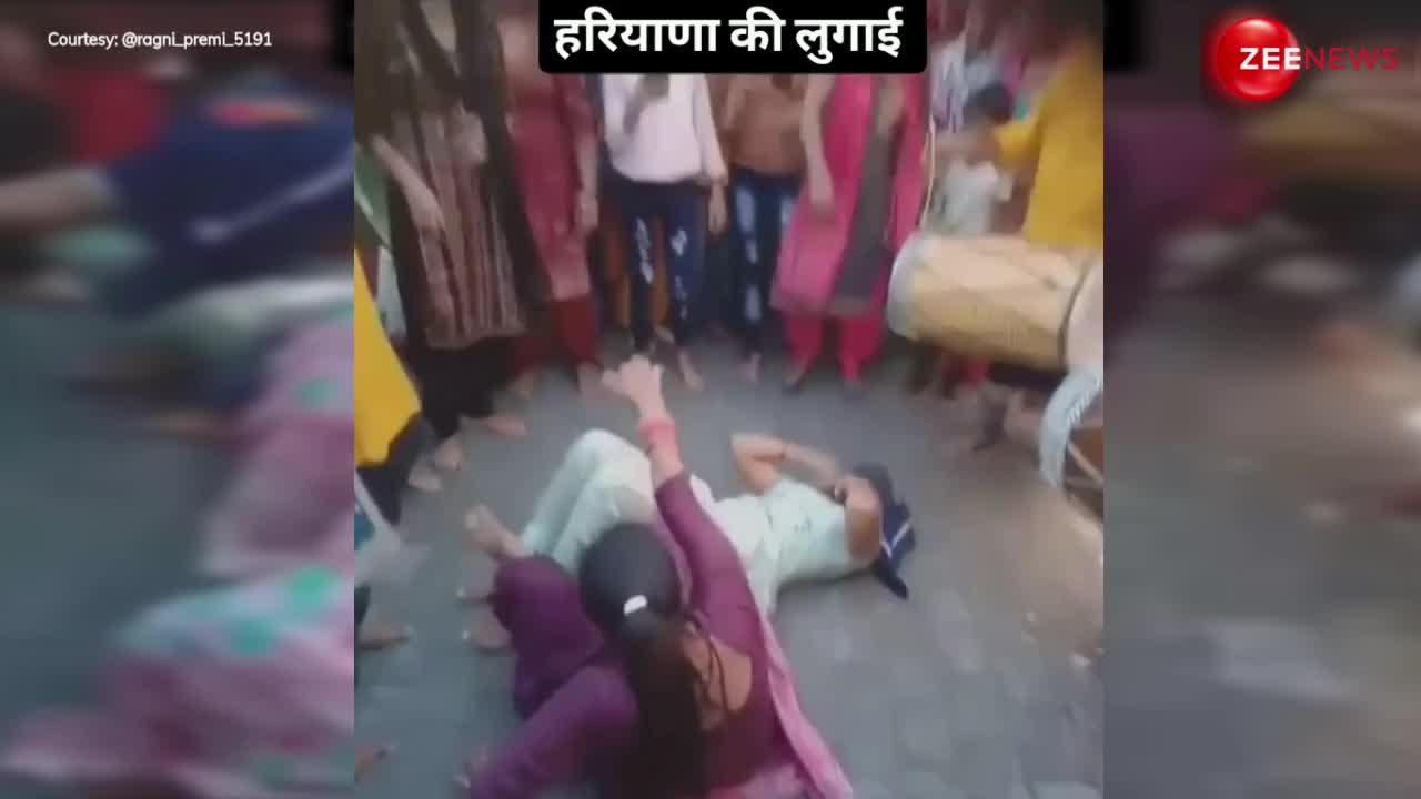 Desi Bhabhi Dance: बीच सड़क ढोल पर देसी भाभी ने किया लेट-लेटकर नागिन डांस, हरियाणा की लुगाई का जोश देख भूल जाओगे सपना