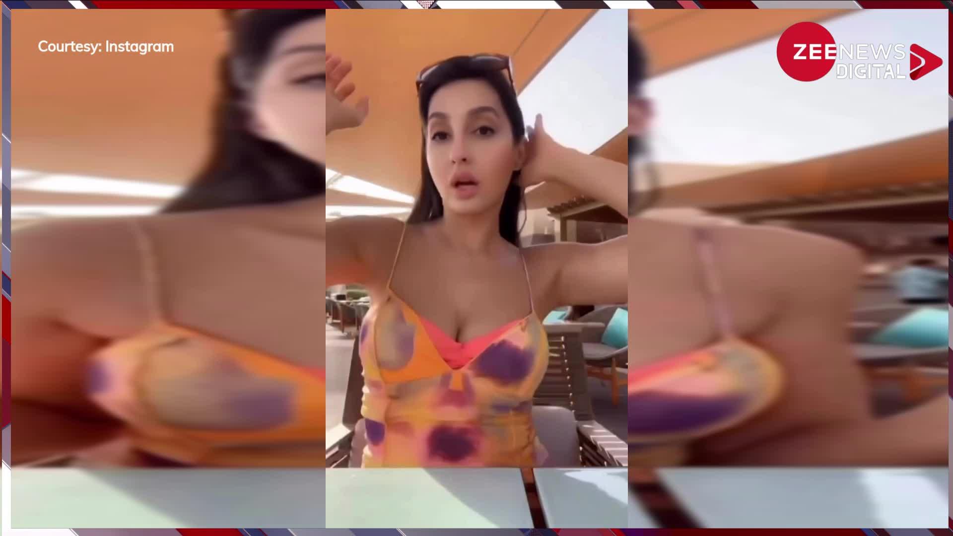 Nora Fatehi: नोरा फतेही ने डीप नेक ड्रेस पहन ठंडी में बढ़ाई गर्मी