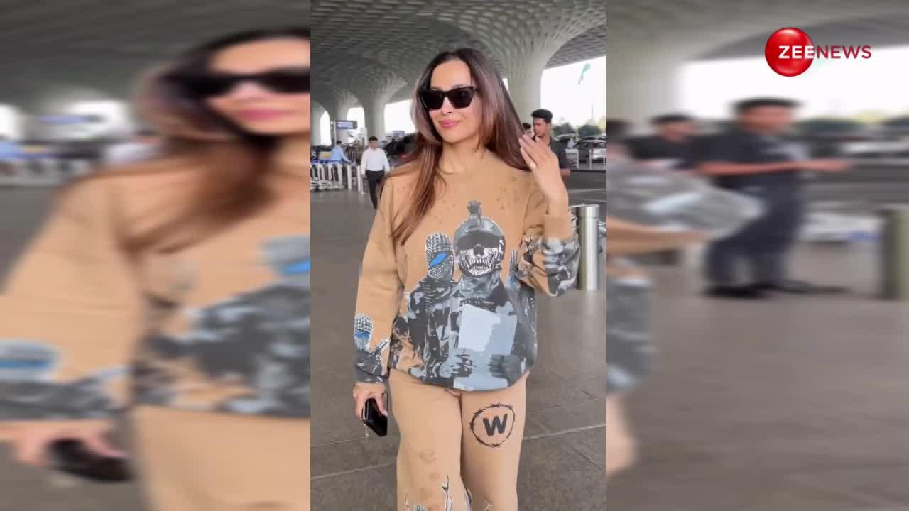 कूल हुडी स्वेटर पहन एयरपोर्ट पर बिंदास अंदाज में दिखीं Malaika Arora, लोग बोले- फिगर से 21 की लग रही हैं