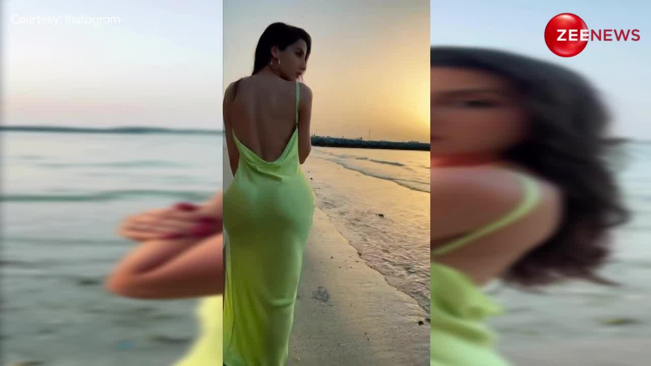 Nora Fatehi इतनी पतली ड्रेस पहन समंदर किनारे बलखाईं, लटके-झटके दिखाने लगीं तो यहां अटकी रह गई सबकी नजरें