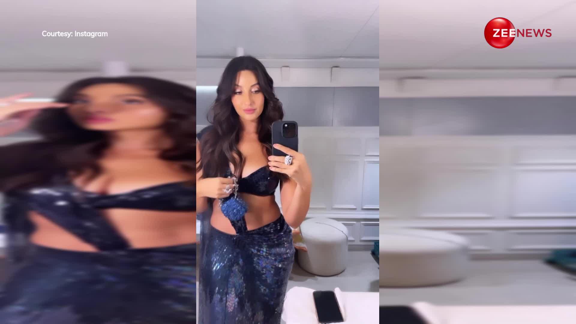 Nora Fatehi ने साड़ी में दिया बोल्ड लुक, अदाएं देखकर फैंस का हुआ बुरा हाल