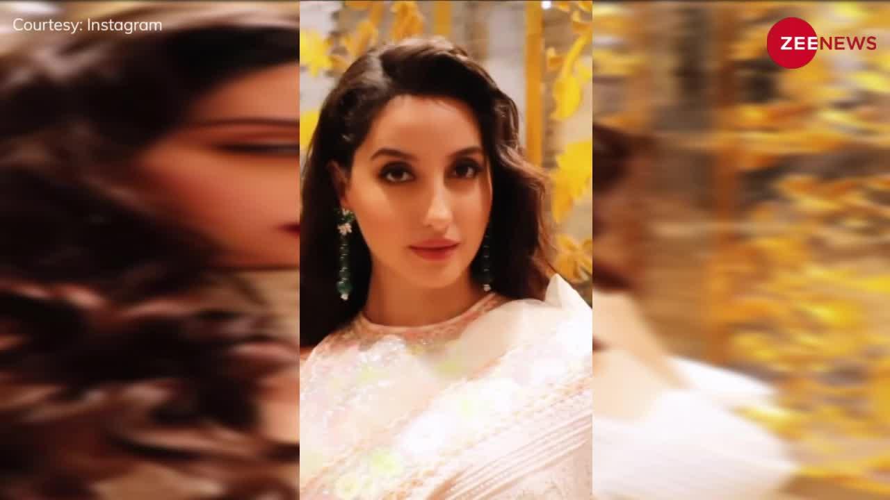 Nora Fatehi ने डीपनेक ब्लाउज में दिखाया सिजलिंग अवतार, अदाओं का ऐसा चलाया जादू कर दिया क्लीन बोल्ड