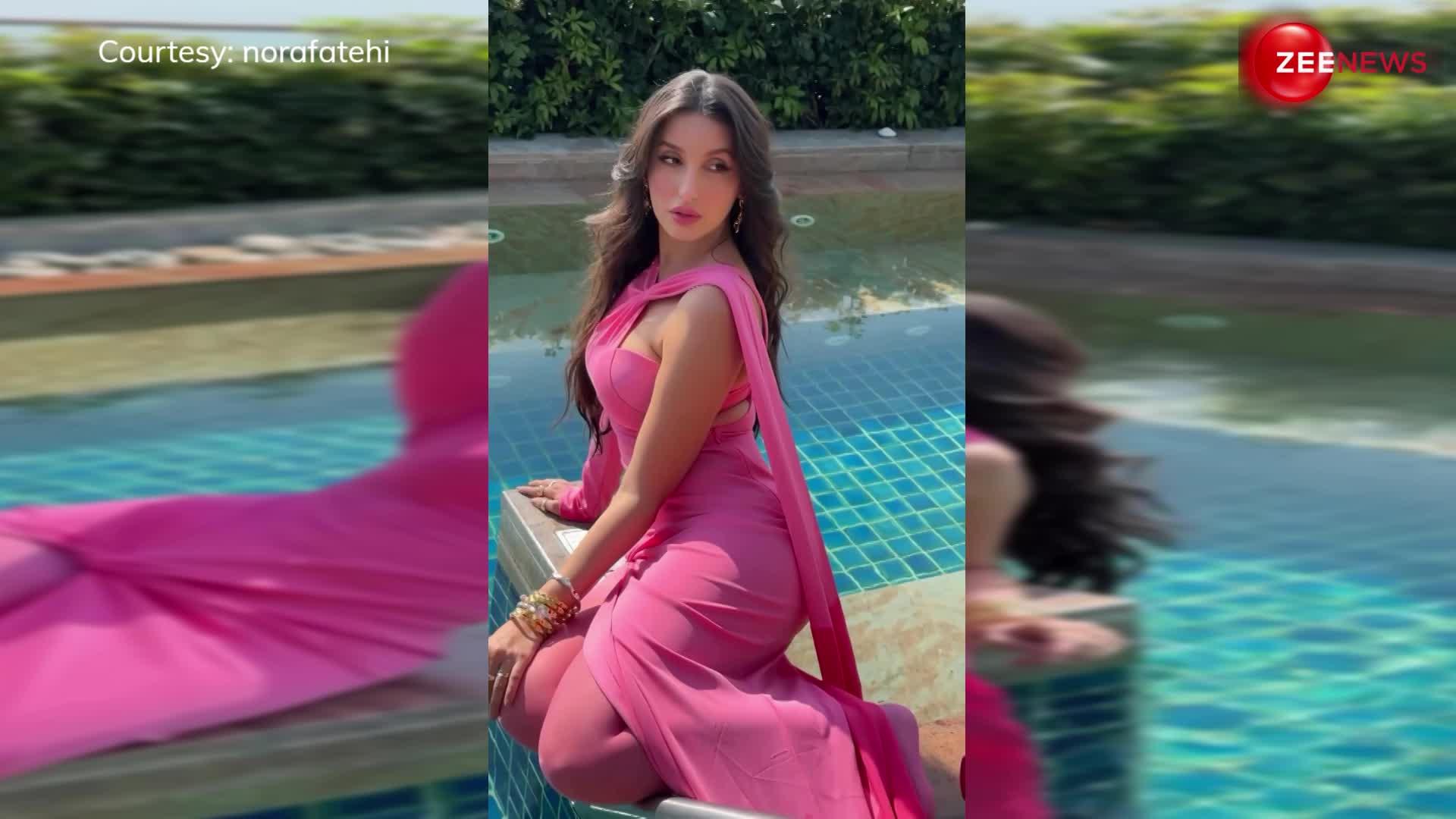 पिंक ड्रेस पहन Nora Fatehi ने चलाया हुस्न का जादू, कैमरे के सामने दिए कई कातिलाना पोज, लुक देख घायल हुए फैंस-video