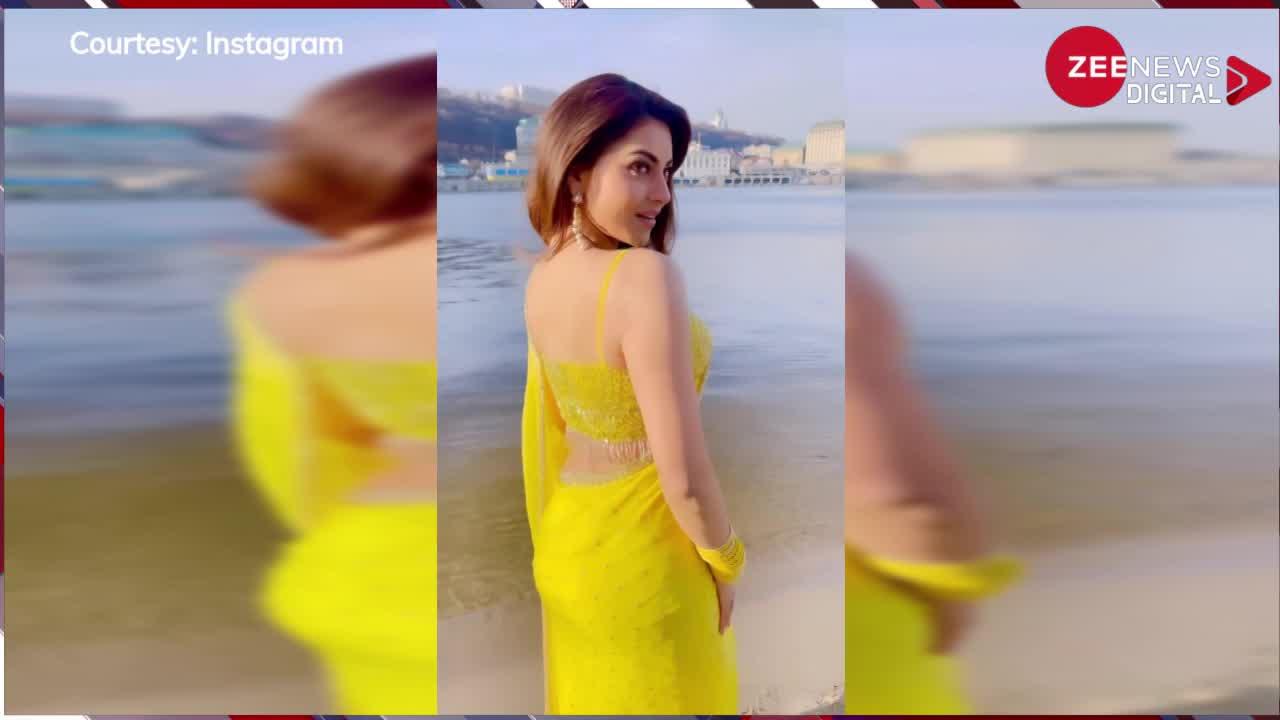 बीच पर साड़ी पहन कर पहुंचीं Urvashi Rautela, फिर करने लगीं अजीब हरकतें; देख लोग बोले-दिमाग का इलाज कराओ