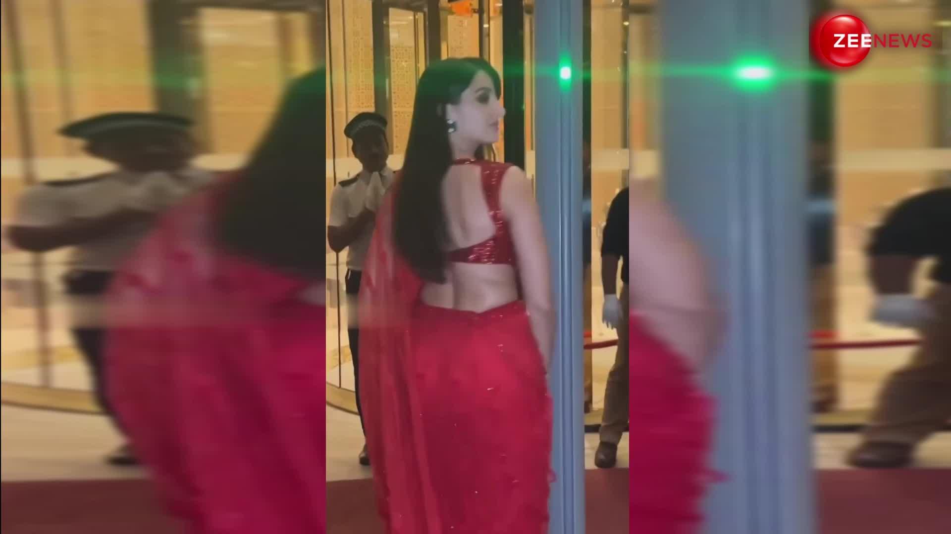 हाय गर्मी! चमकती-धमकती लाल साड़ी पहन Nora Fatehi ने बढ़ाया इंटरनेट का पारा, सिजलिंग लुक देख अटक गई लोगों की धड़कन